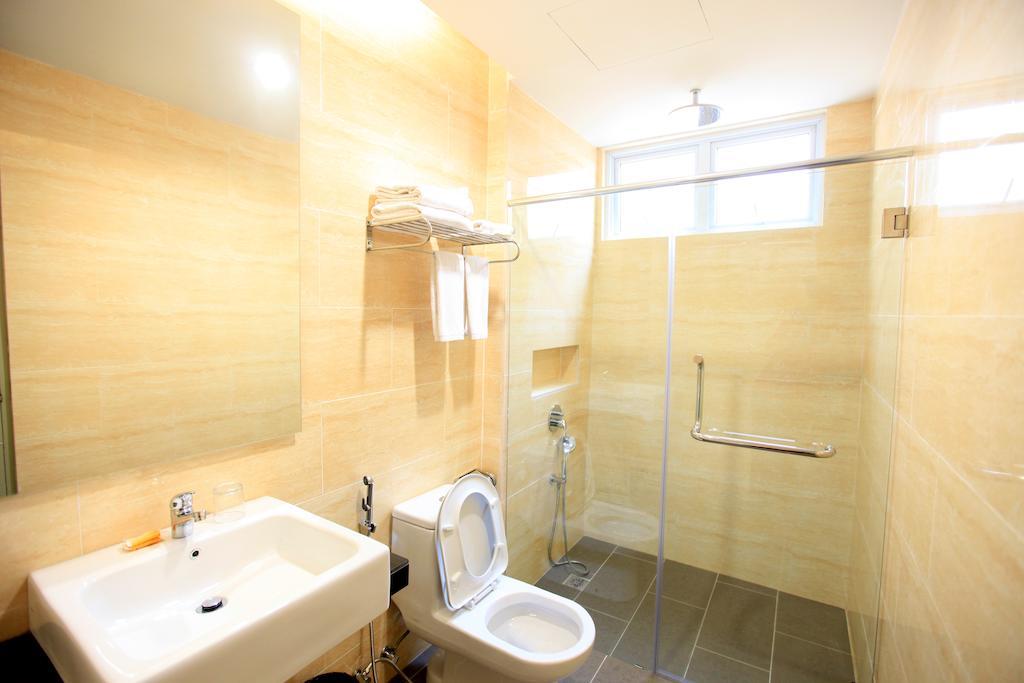 Merdeka Suites Hotel Miri Quarto foto